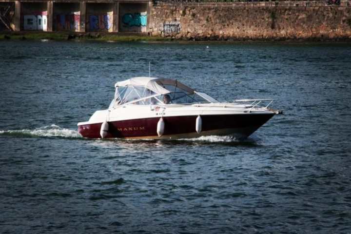 a small boat in a body of water