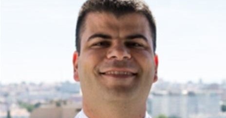 a man smiling for the camera